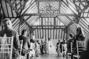 Wedding Guests sat watching ceremony