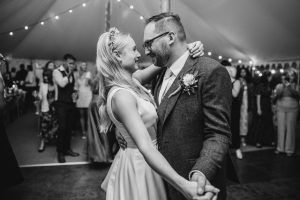 Black and White photo of Bride and groom having their first dance | Wedding Survival Kit